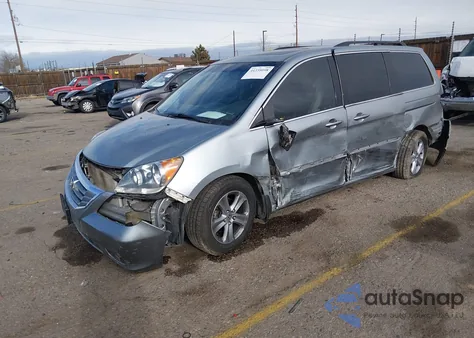 2009 Honda Odyssey Touring z USA, uszkodzony, nr VIN 5FNRL38959B020293